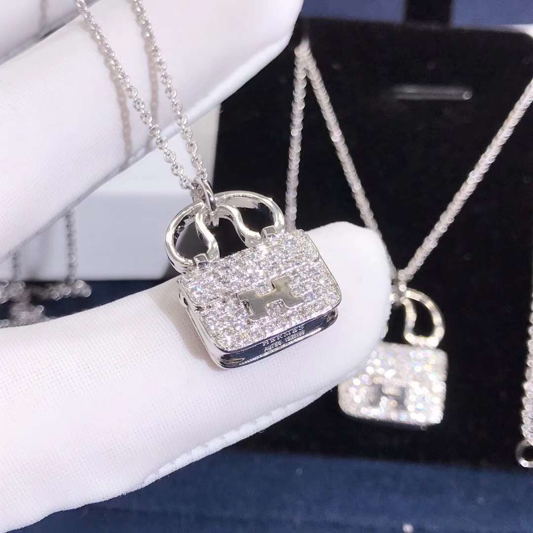 Hermes bag necklace best sale